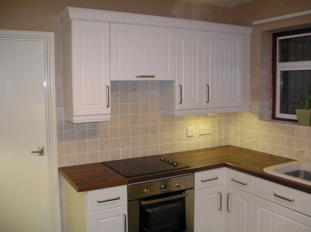 Earlier kitchen fitted by Steve, white units