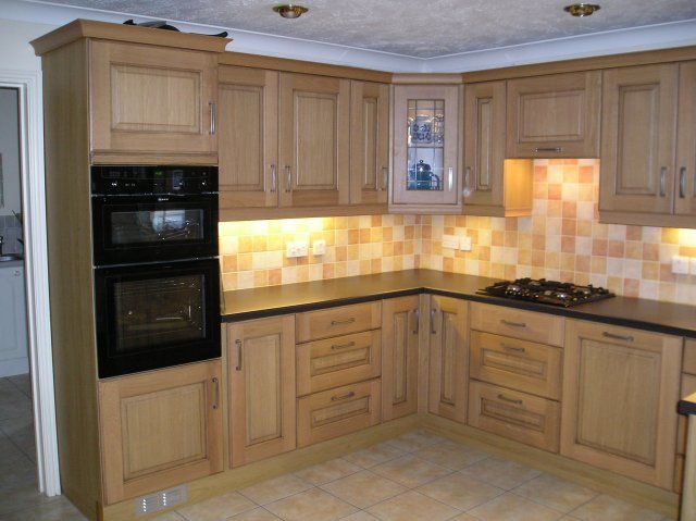 Earlier kitchen fitted by Steve, light wood units