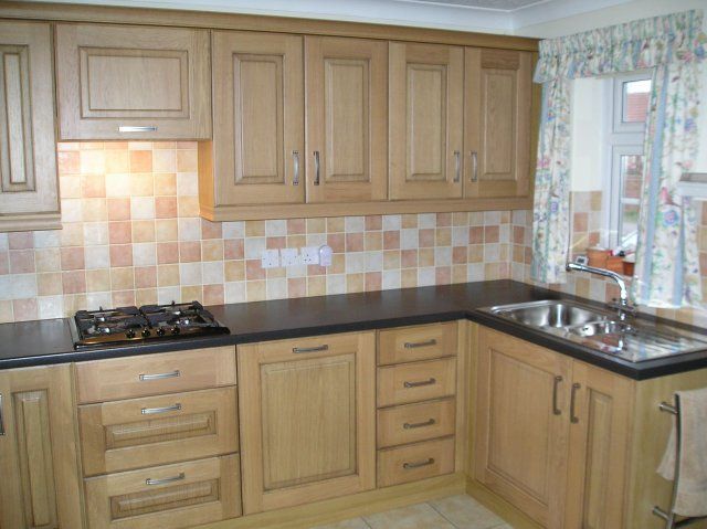 The same light wood kitchen, second view