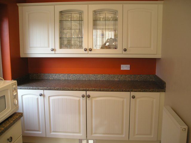 The same cream kitchen, second view