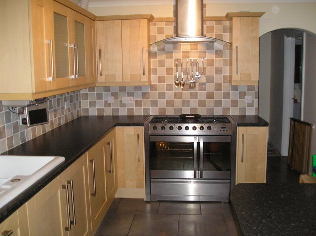 Earlier kitchen fitted by Steve, pale wood units